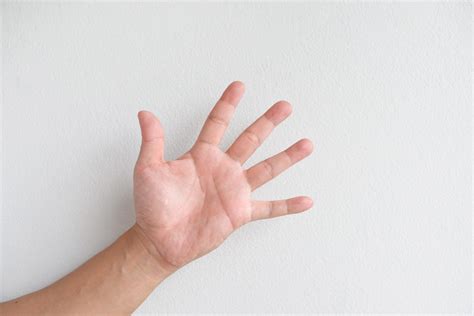 símbolo do pcc com a mão